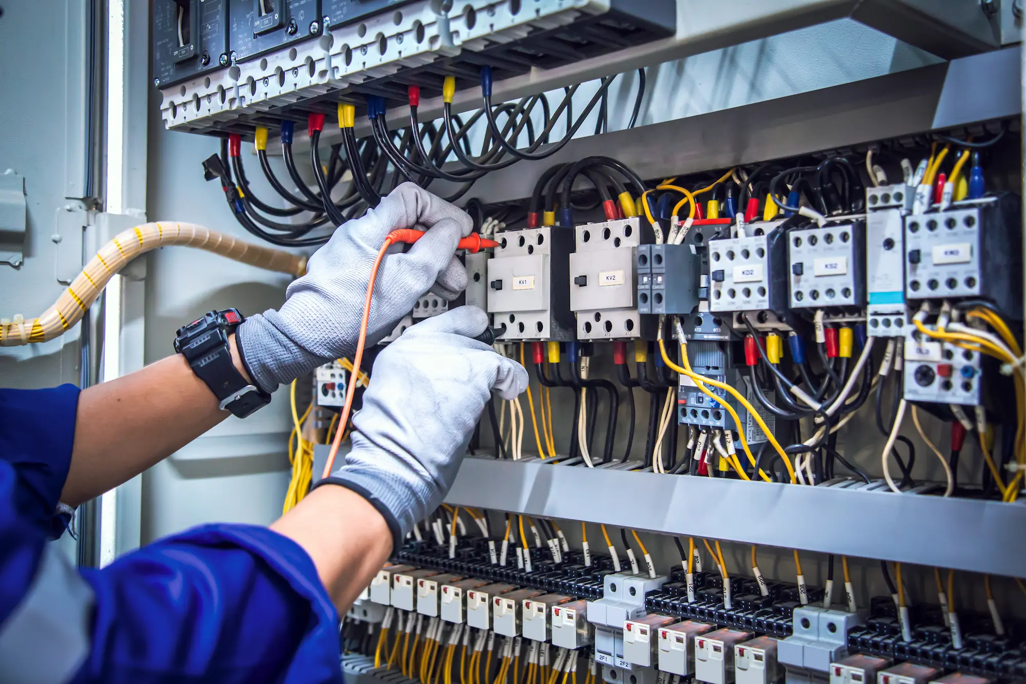 electrician-hand-voltmeter-checking-electric-current-voltage-circuit-breaker