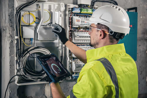 20230725-man-electrical-technician-working-switchboard